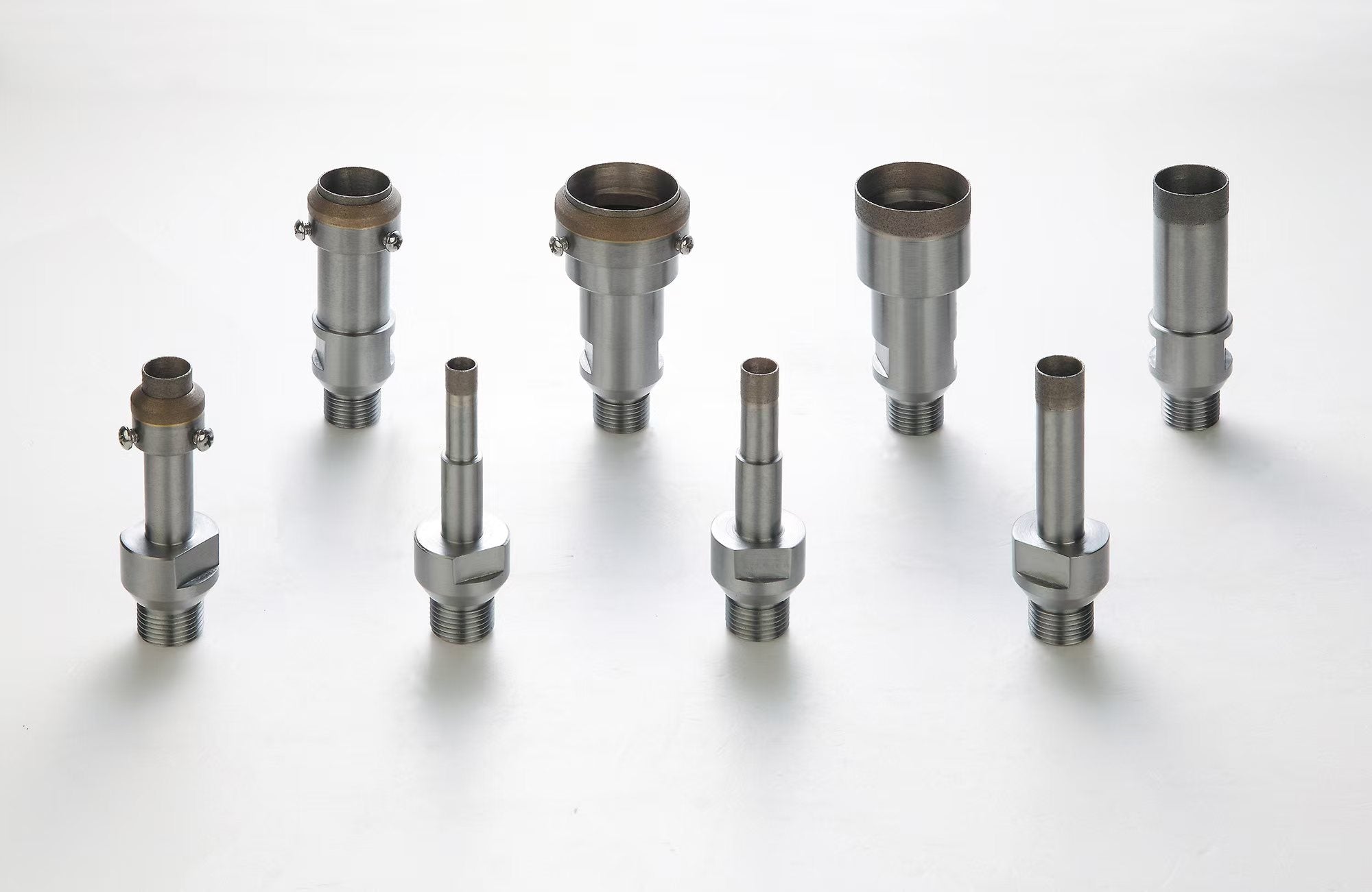 Glass drilling bit with threaded tip